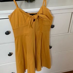 Yellow dress with a bow detail